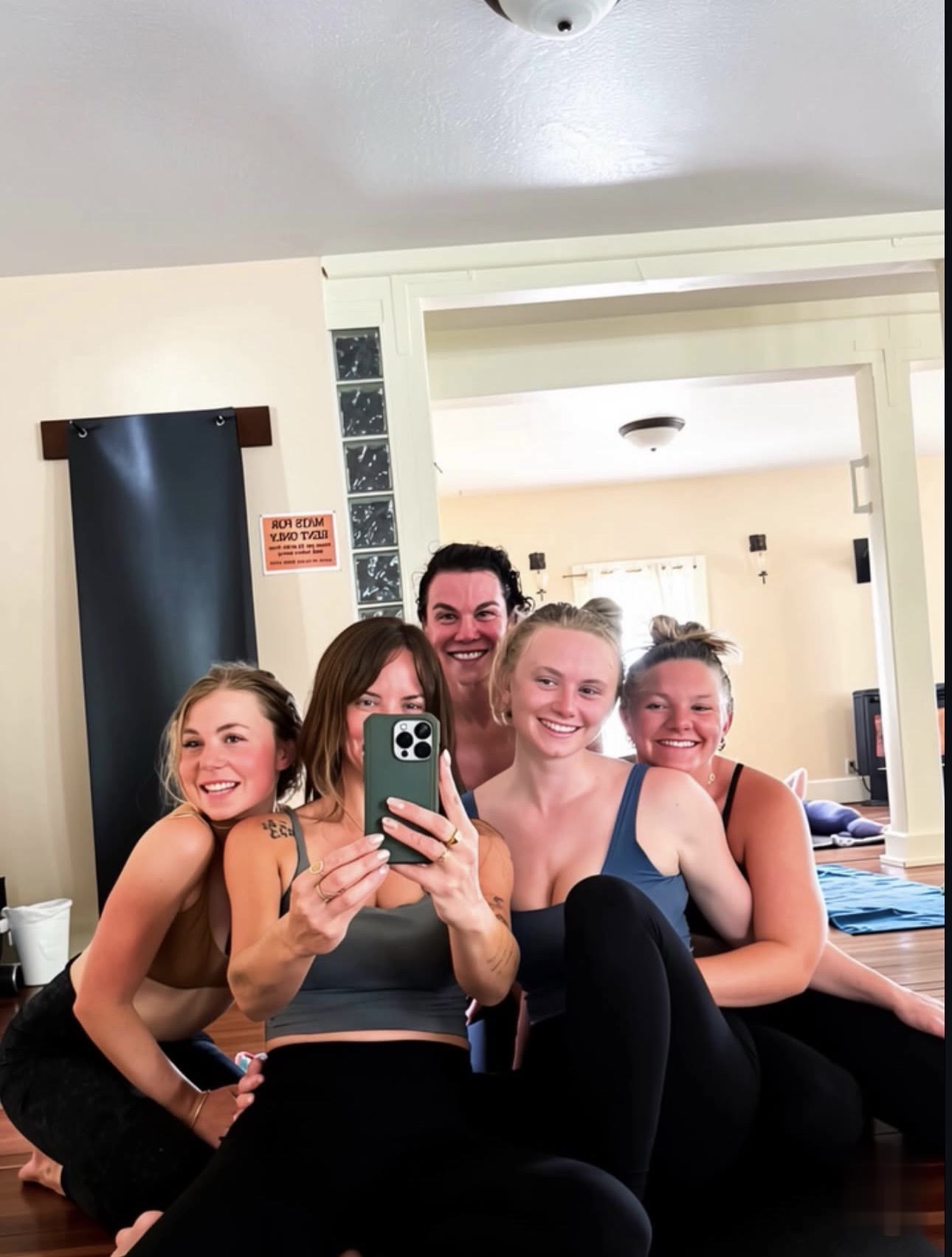 Post-class smiles in the mirror