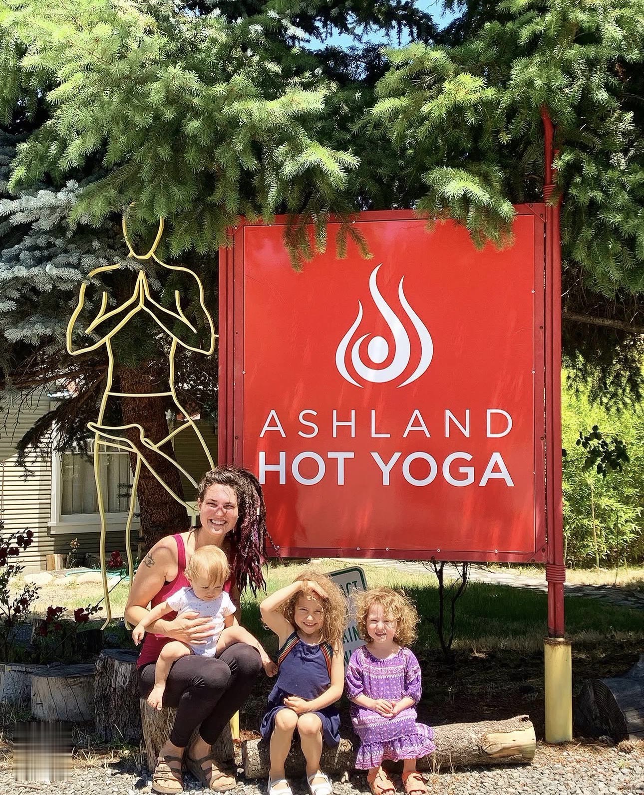 A family visit to the studio sign