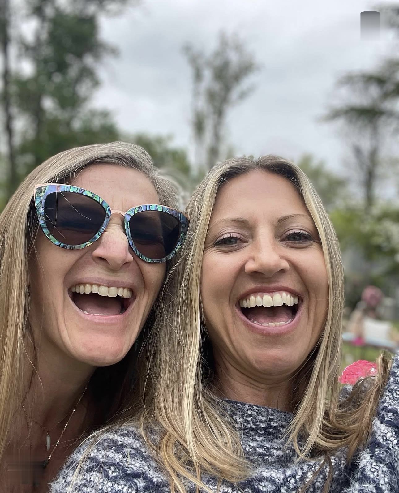 Laughing together at a studio gathering