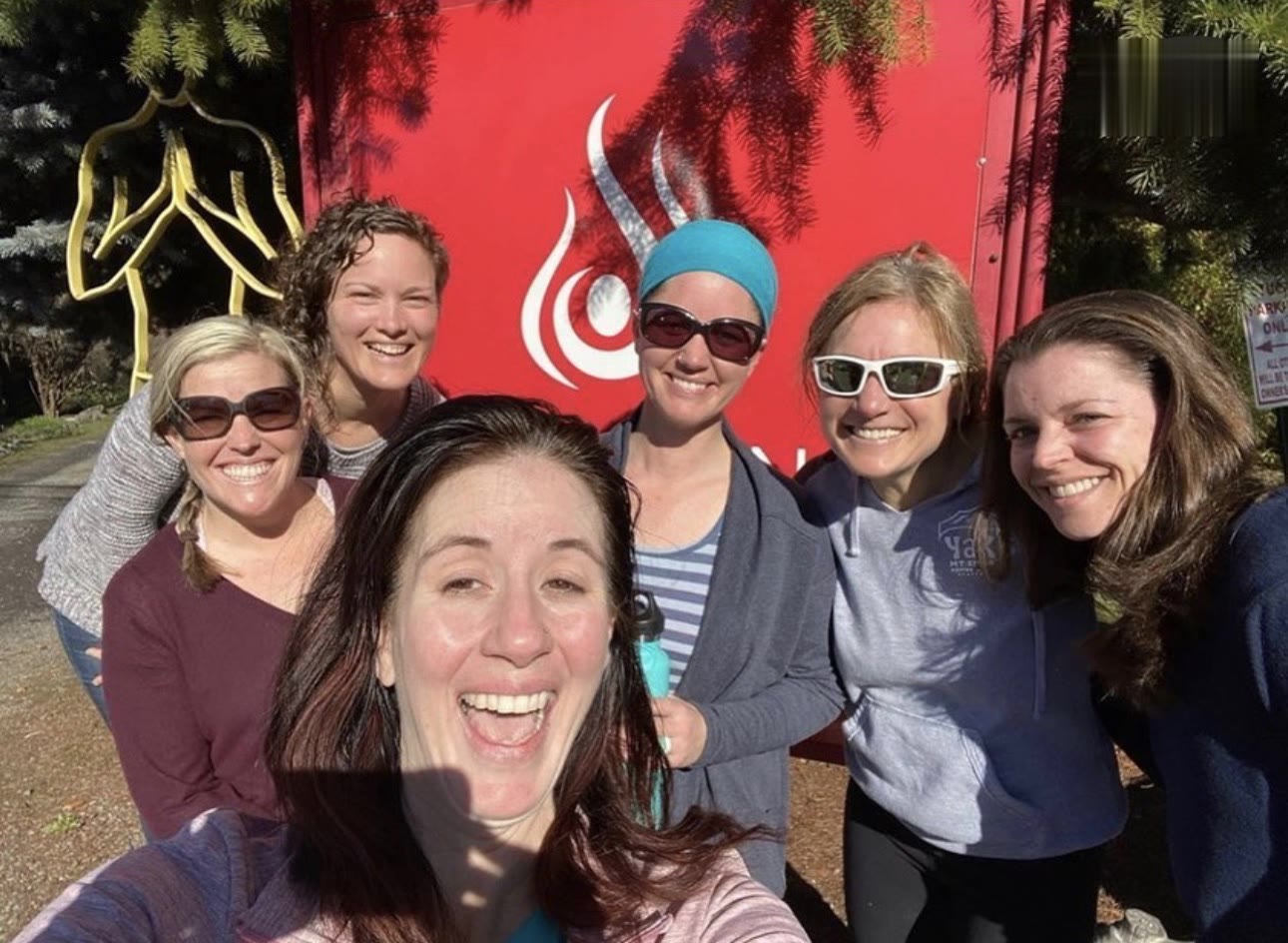 Post-class selfie at the classic red sign
