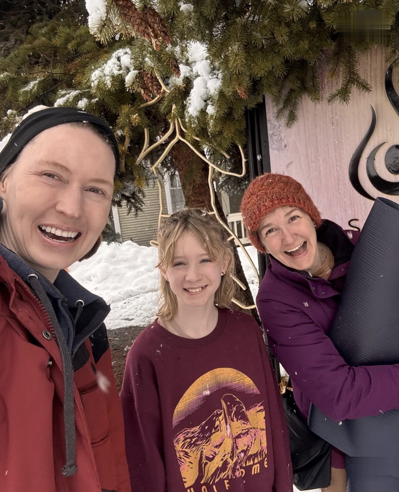 A snow-day selfie outside the studio